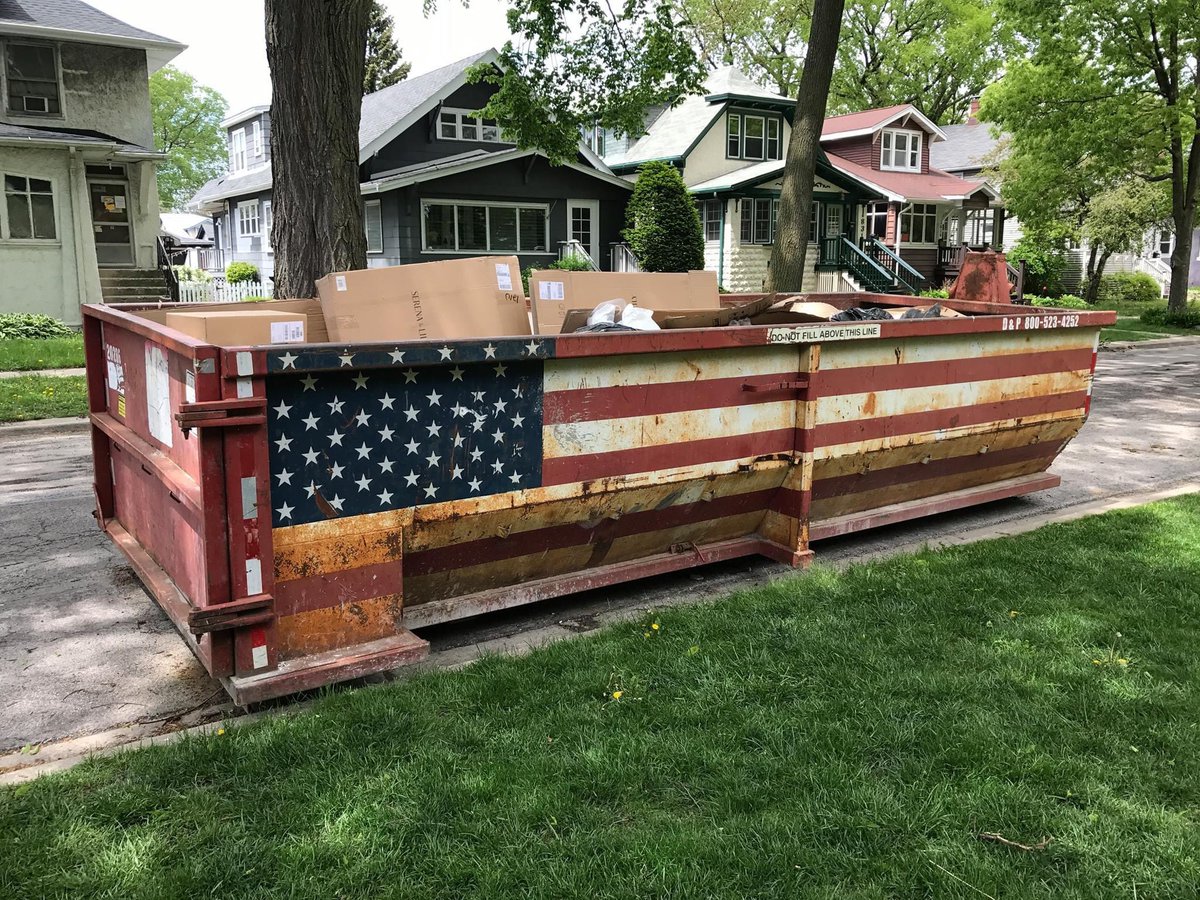 dumpster painted with American flag